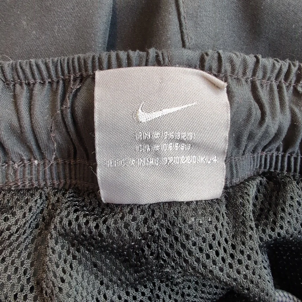 Vintage‎ Nike Woven Cargo Track Pants Mens L Black Lined Windbreaker Baggy Y2K